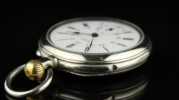 B. Reinin pocket watch — side profile